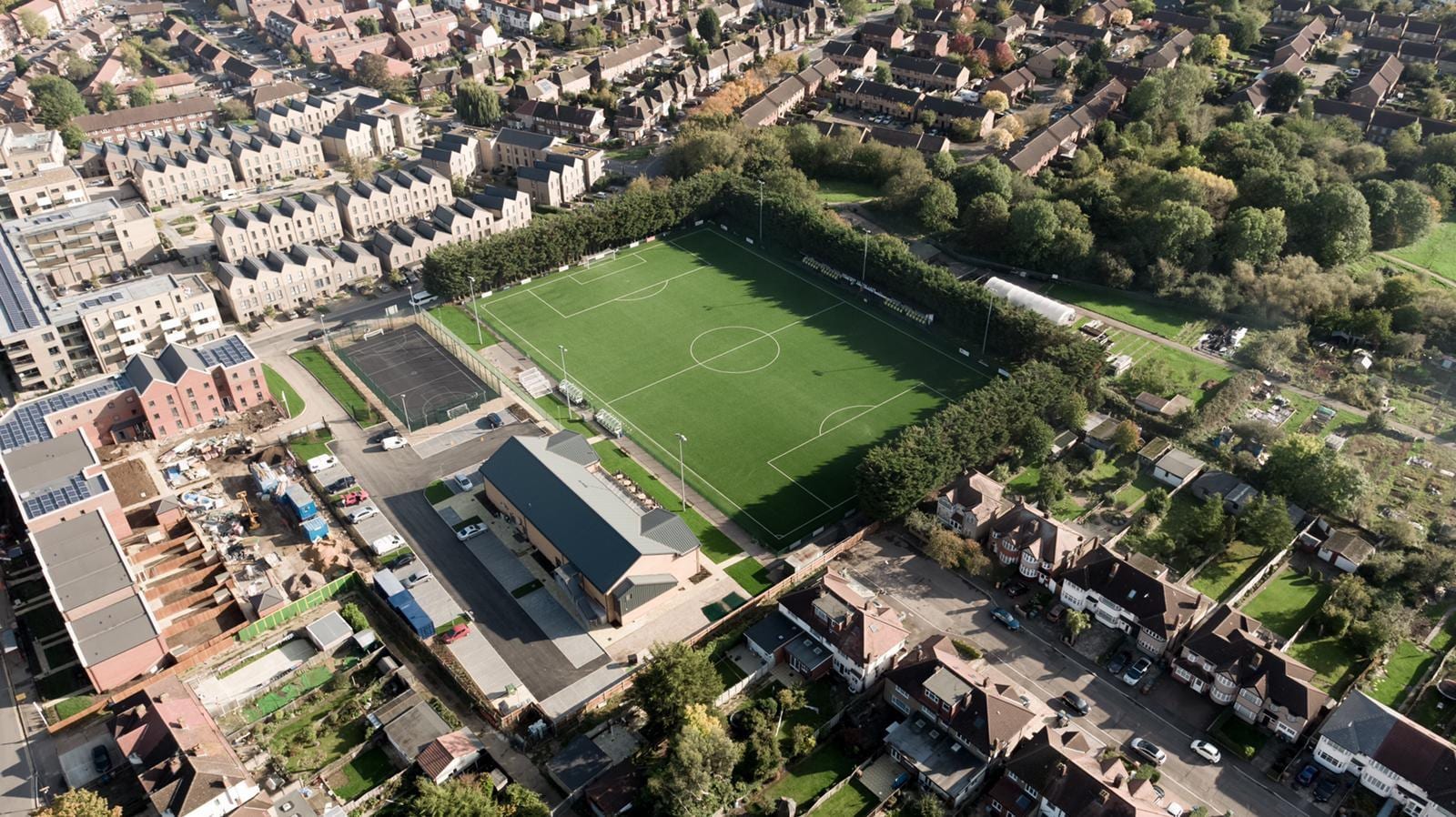 Aerial view of Tithe Farm, home of Rayners Lane FC — the 3G pitch, clubhouse and surrounding Harrow